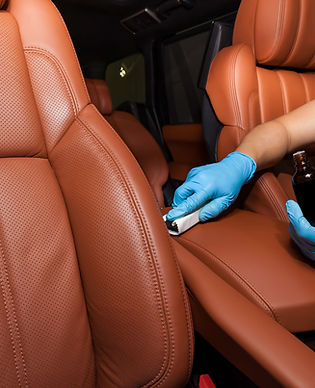Interior ceramic coating being applied to leather seating